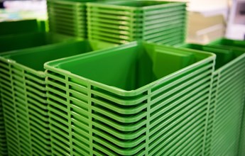 green-plastic-home-containers-tower-at-store-uh572az